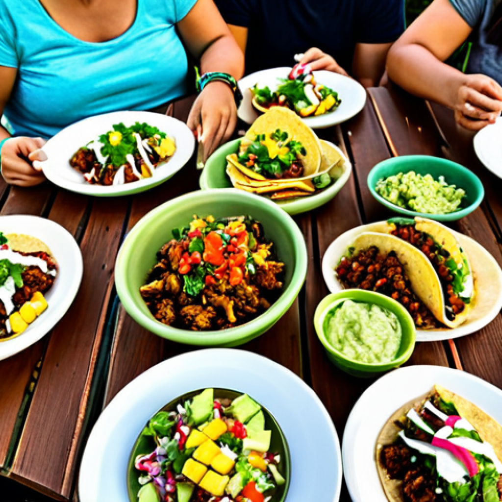 대체육 요리의 대중화 트렌드 - Vegan Taco Fiesta**
"A vibrant and colorful table setting featuring vegan 'carnitas' tacos with pin...